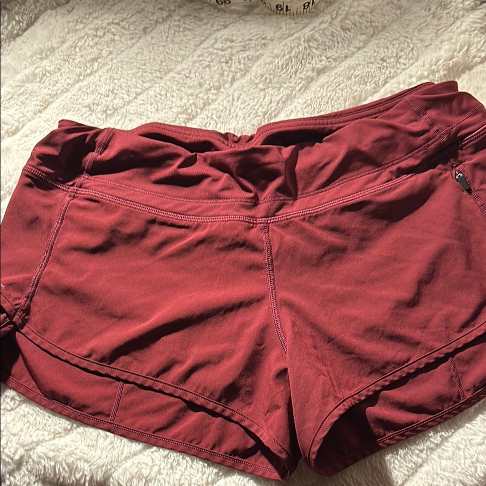 Women's Burgundy Short Shorts for jogging or exercising.